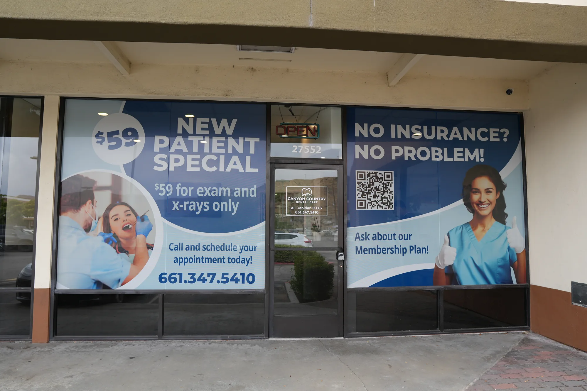 Canyon Country Dental Care storefront window advertising the $59 new patient special and the membership plan